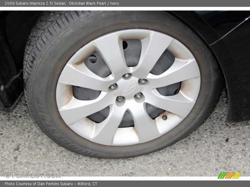Obsidian Black Pearl / Ivory 2009 Subaru Impreza 2.5i Sedan