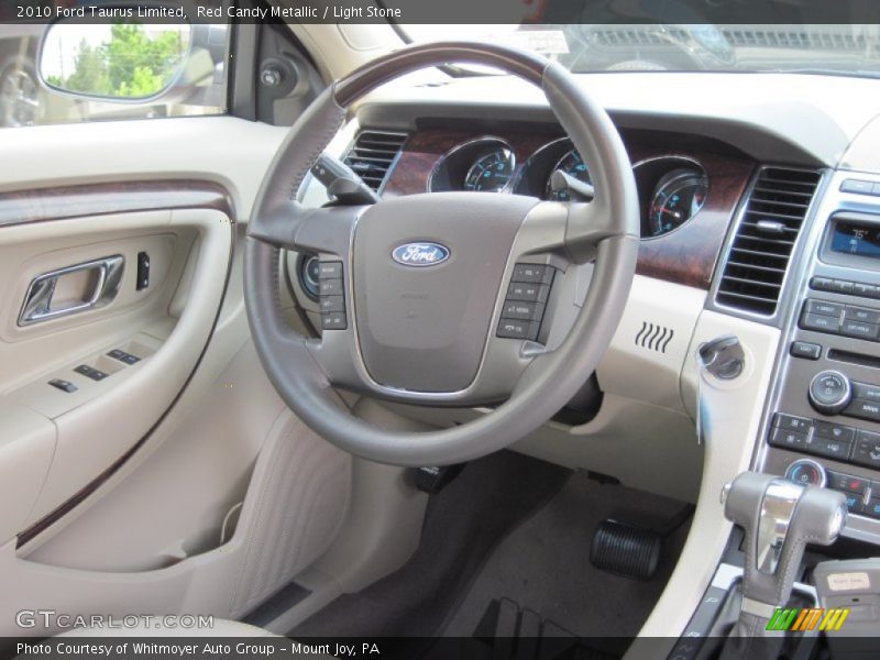 Red Candy Metallic / Light Stone 2010 Ford Taurus Limited