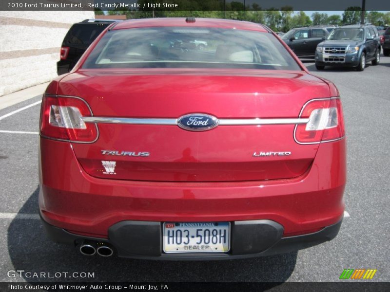 Red Candy Metallic / Light Stone 2010 Ford Taurus Limited