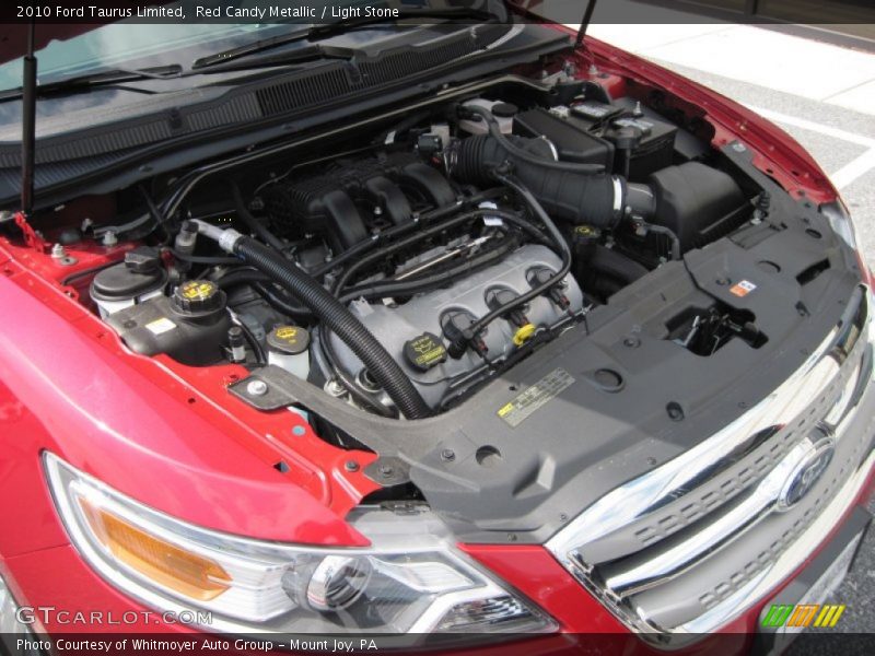 Red Candy Metallic / Light Stone 2010 Ford Taurus Limited