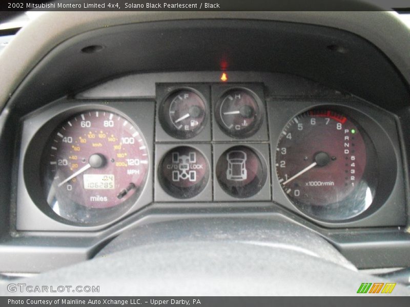 Solano Black Pearlescent / Black 2002 Mitsubishi Montero Limited 4x4