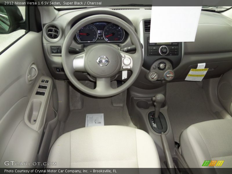 Super Black / Charcoal 2012 Nissan Versa 1.6 SV Sedan