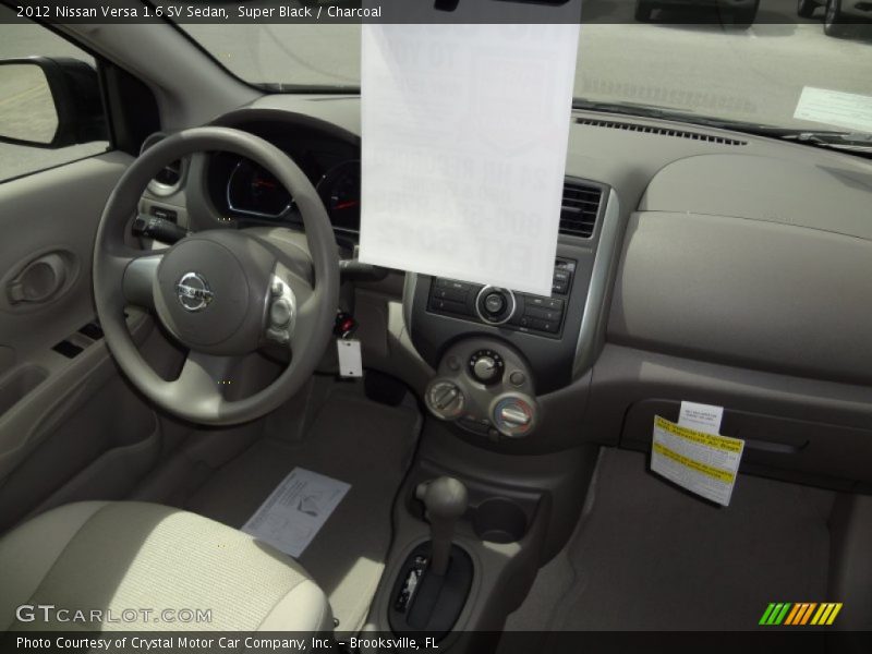 Super Black / Charcoal 2012 Nissan Versa 1.6 SV Sedan