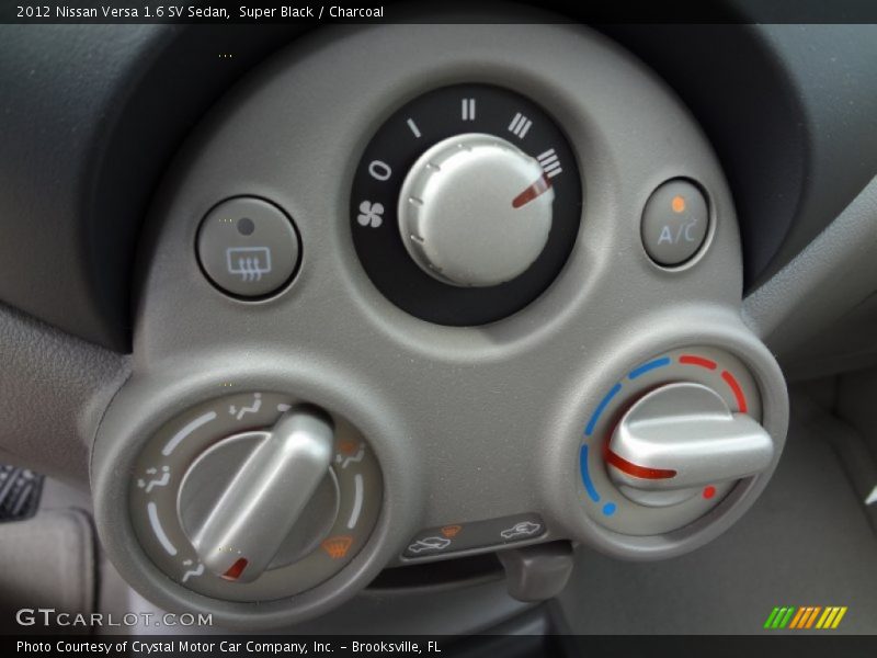 Super Black / Charcoal 2012 Nissan Versa 1.6 SV Sedan