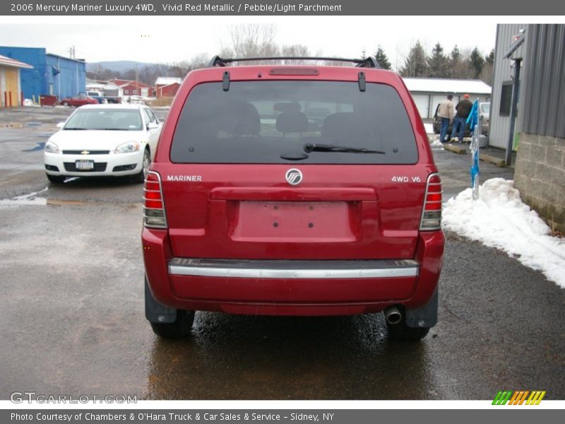 Vivid Red Metallic / Pebble/Light Parchment 2006 Mercury Mariner Luxury 4WD