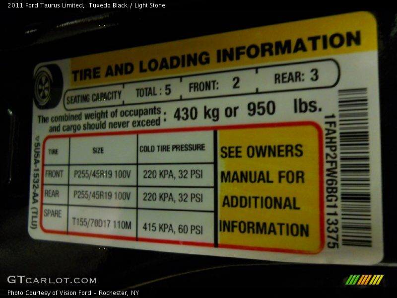 Tuxedo Black / Light Stone 2011 Ford Taurus Limited