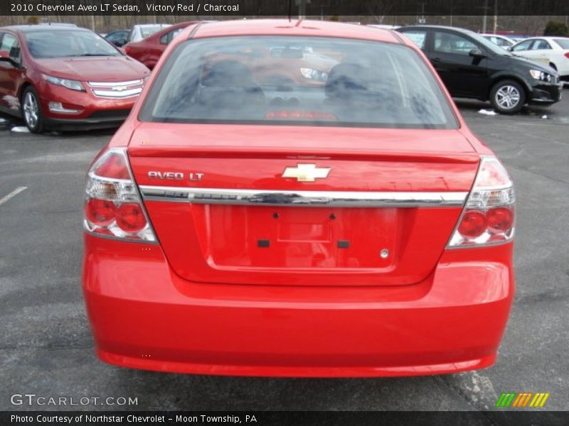 Victory Red / Charcoal 2010 Chevrolet Aveo LT Sedan