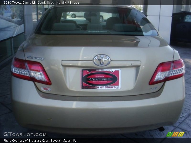 Sandy Beach Metallic / Bisque 2010 Toyota Camry LE
