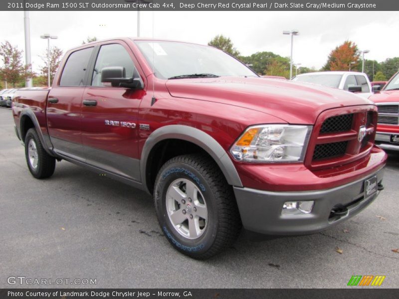 Front 3/4 View of 2011 Ram 1500 SLT Outdoorsman Crew Cab 4x4