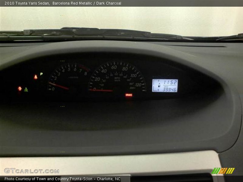 Barcelona Red Metallic / Dark Charcoal 2010 Toyota Yaris Sedan