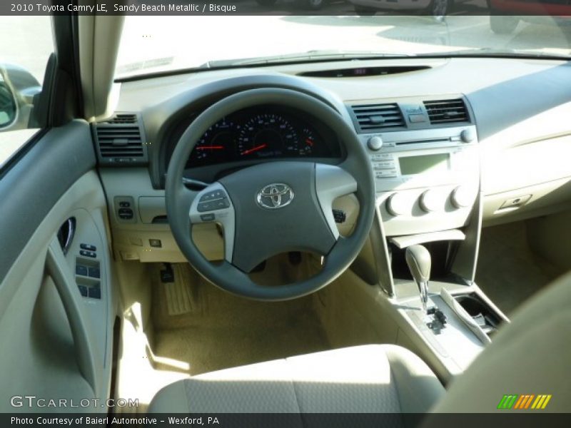 Sandy Beach Metallic / Bisque 2010 Toyota Camry LE