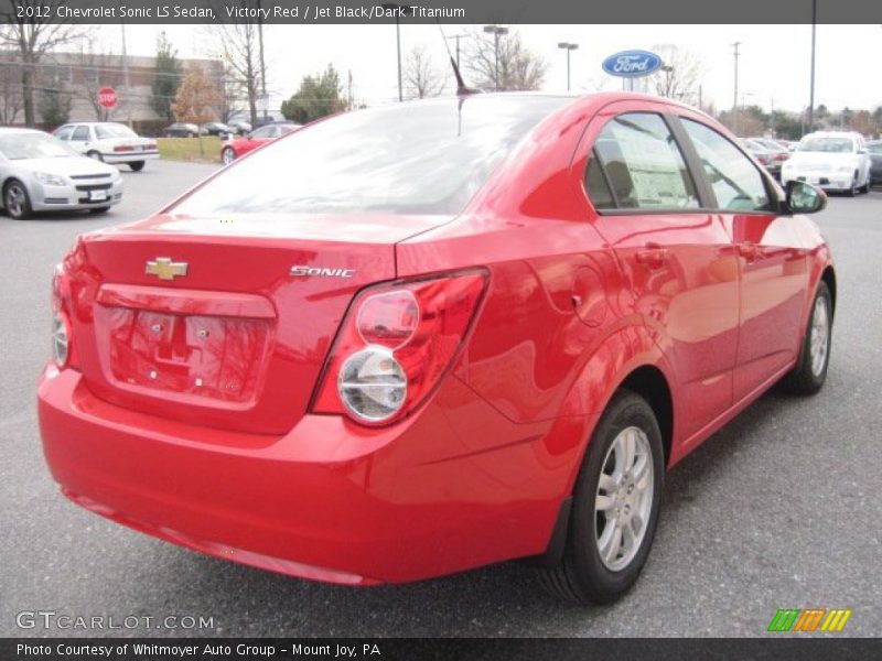 Victory Red / Jet Black/Dark Titanium 2012 Chevrolet Sonic LS Sedan