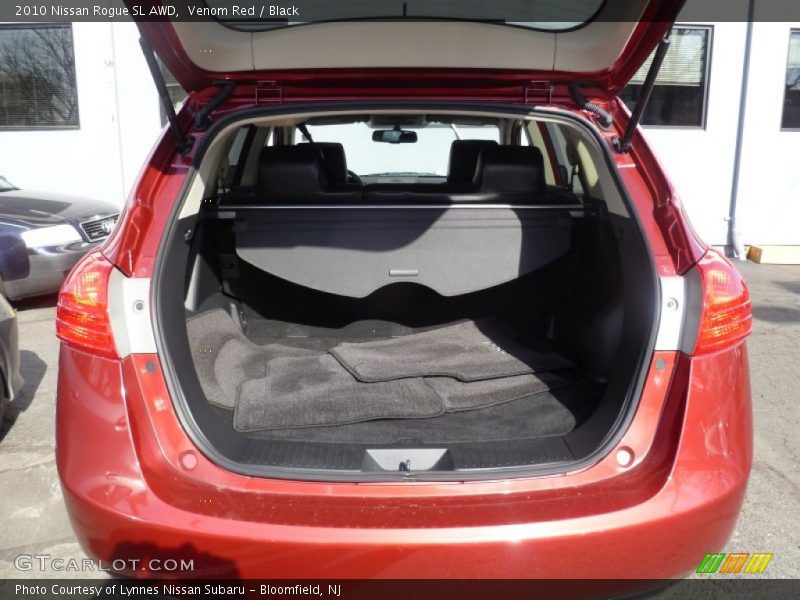 Venom Red / Black 2010 Nissan Rogue SL AWD