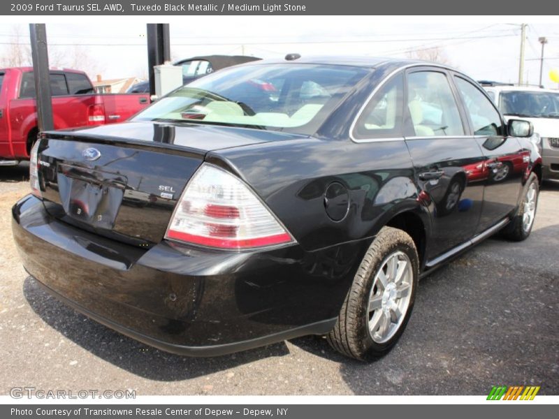 Tuxedo Black Metallic / Medium Light Stone 2009 Ford Taurus SEL AWD
