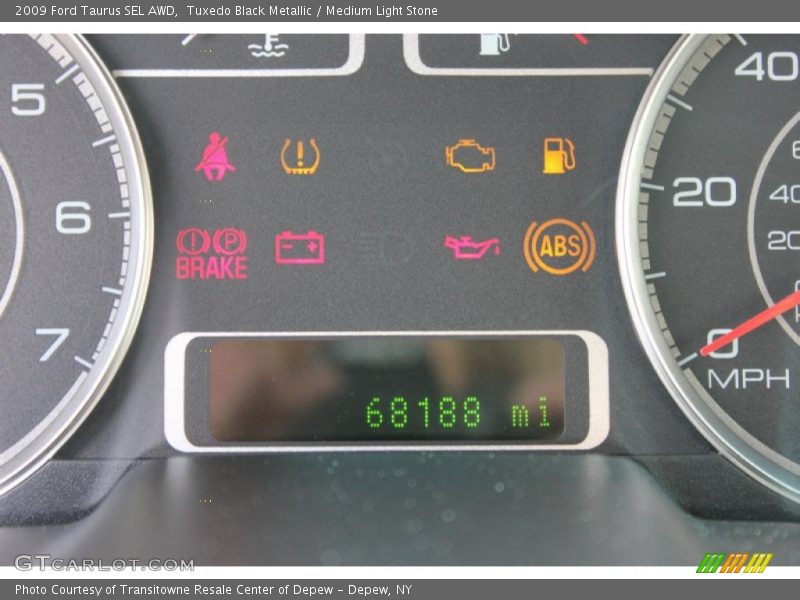 Tuxedo Black Metallic / Medium Light Stone 2009 Ford Taurus SEL AWD