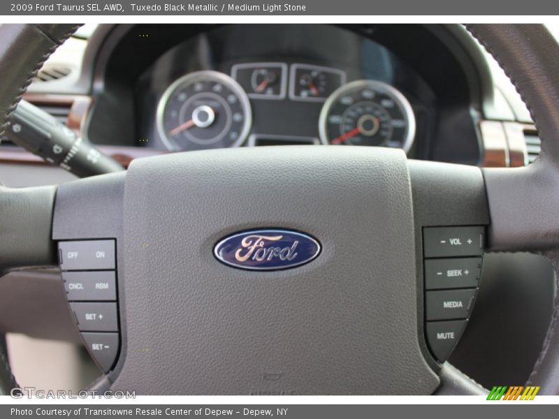 Tuxedo Black Metallic / Medium Light Stone 2009 Ford Taurus SEL AWD