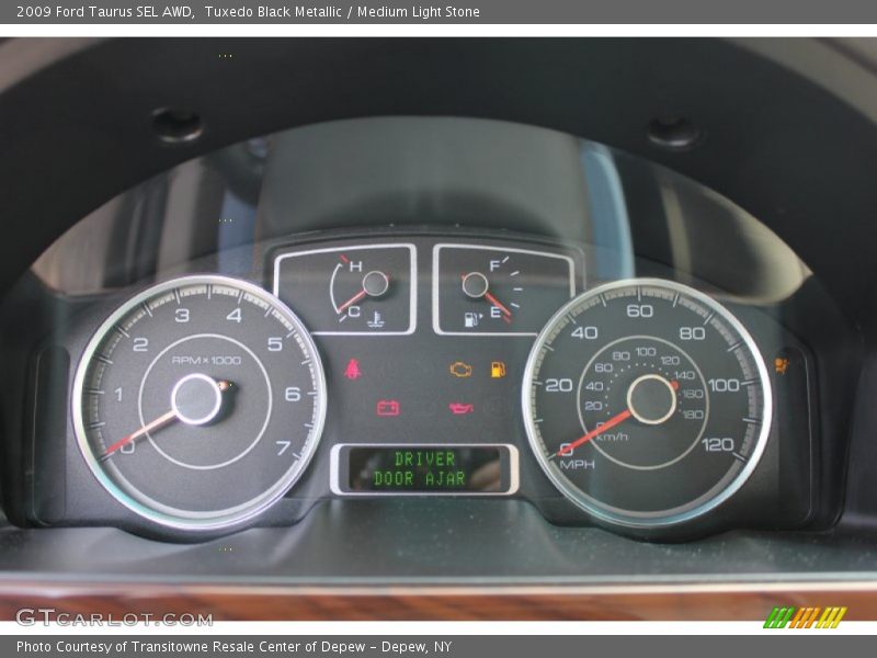 Tuxedo Black Metallic / Medium Light Stone 2009 Ford Taurus SEL AWD