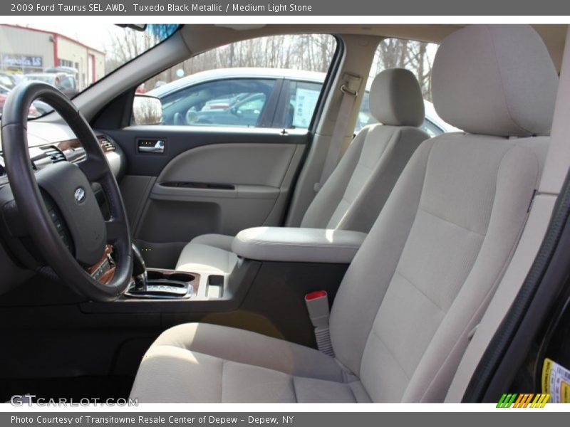 Tuxedo Black Metallic / Medium Light Stone 2009 Ford Taurus SEL AWD