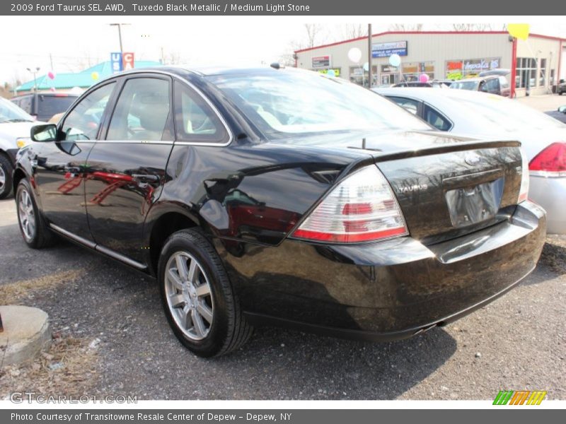Tuxedo Black Metallic / Medium Light Stone 2009 Ford Taurus SEL AWD