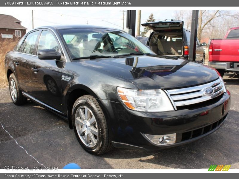 Tuxedo Black Metallic / Medium Light Stone 2009 Ford Taurus SEL AWD