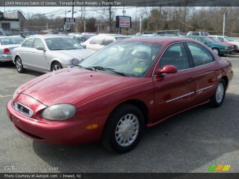 Toreador Red Metallic / Prairie Tan 1999 Mercury Sable LS Sedan