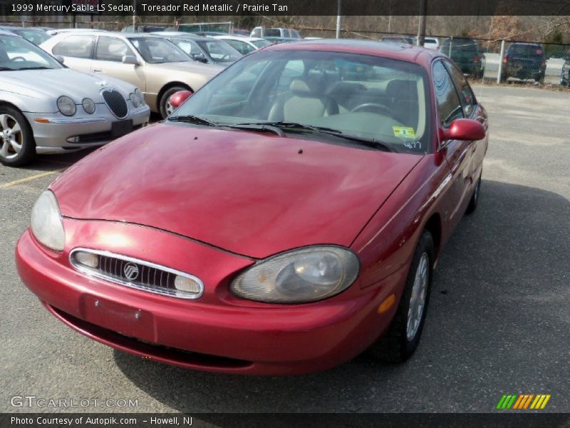 Toreador Red Metallic / Prairie Tan 1999 Mercury Sable LS Sedan