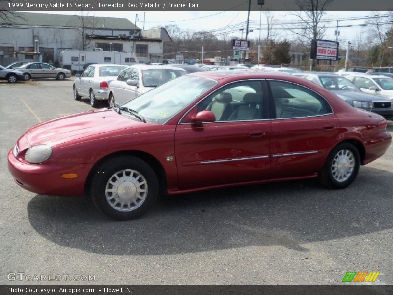 Toreador Red Metallic / Prairie Tan 1999 Mercury Sable LS Sedan