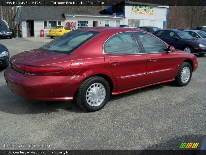 Toreador Red Metallic / Prairie Tan 1999 Mercury Sable LS Sedan