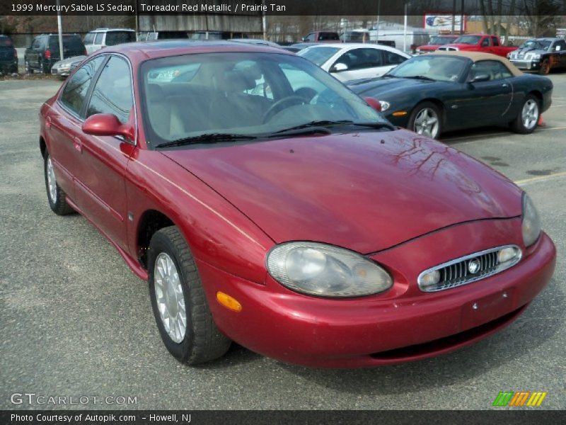 Toreador Red Metallic / Prairie Tan 1999 Mercury Sable LS Sedan