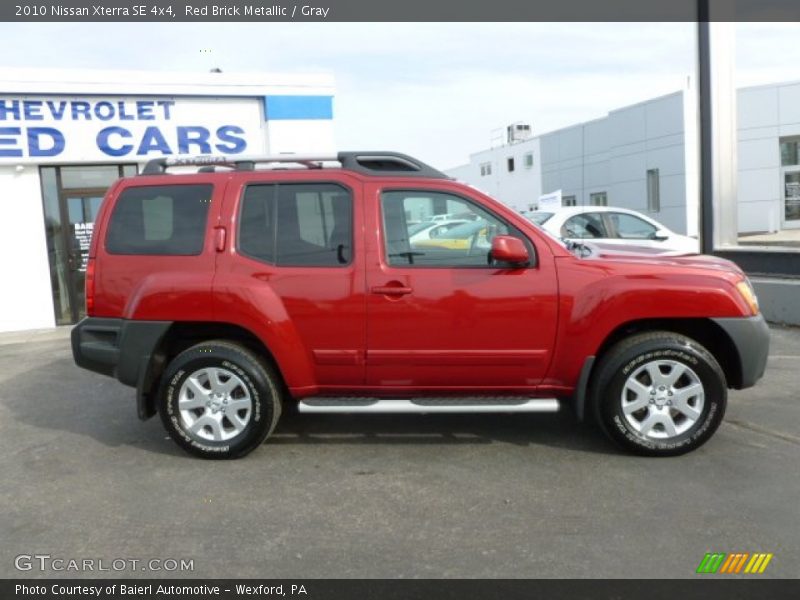 Red Brick Metallic / Gray 2010 Nissan Xterra SE 4x4