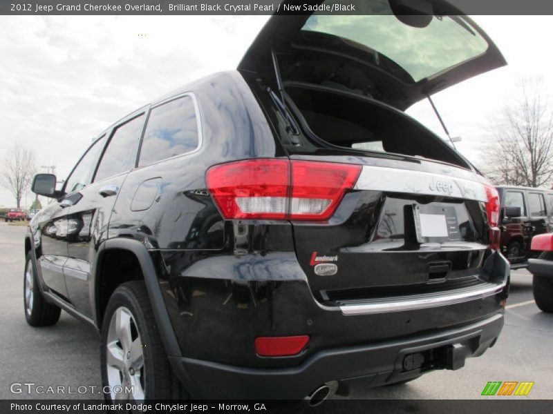 Brilliant Black Crystal Pearl / New Saddle/Black 2012 Jeep Grand Cherokee Overland