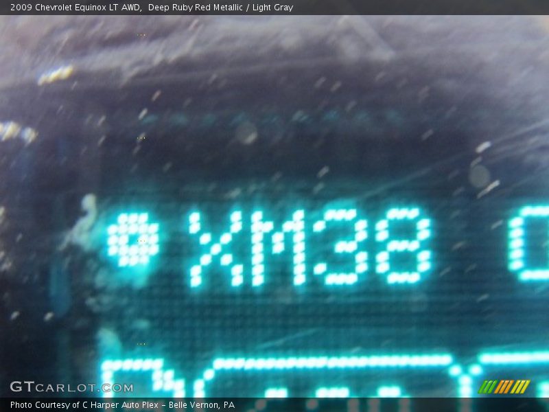 Deep Ruby Red Metallic / Light Gray 2009 Chevrolet Equinox LT AWD