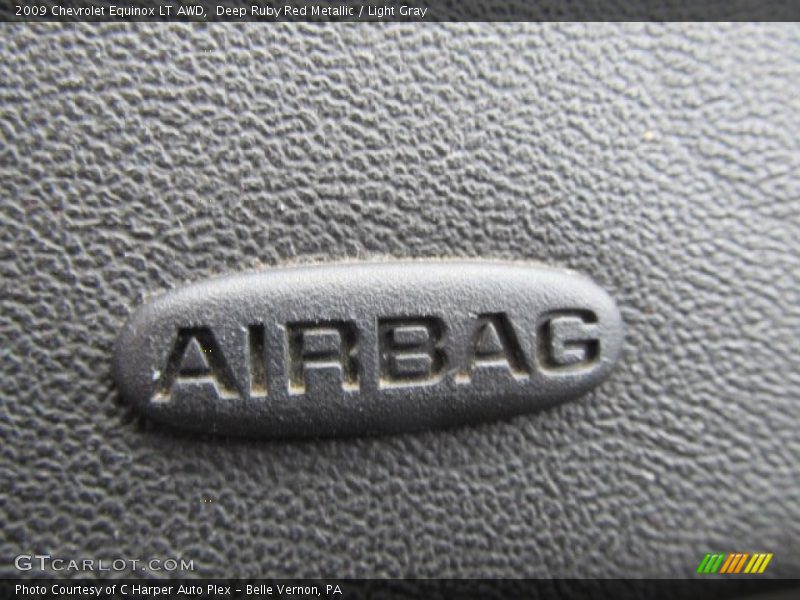 Deep Ruby Red Metallic / Light Gray 2009 Chevrolet Equinox LT AWD