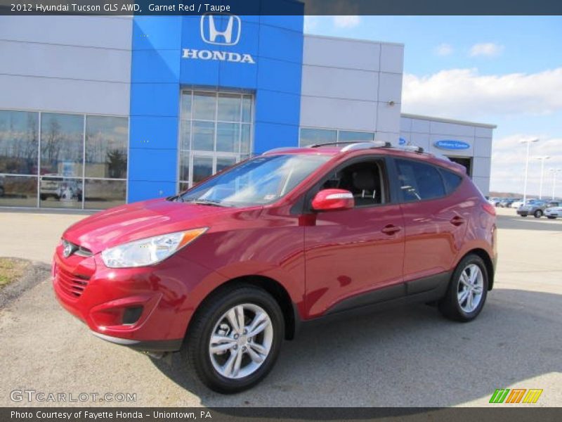 Garnet Red / Taupe 2012 Hyundai Tucson GLS AWD