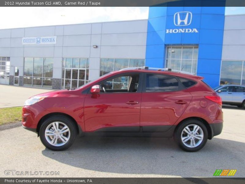 Garnet Red / Taupe 2012 Hyundai Tucson GLS AWD
