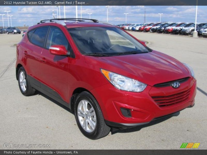 Garnet Red / Taupe 2012 Hyundai Tucson GLS AWD