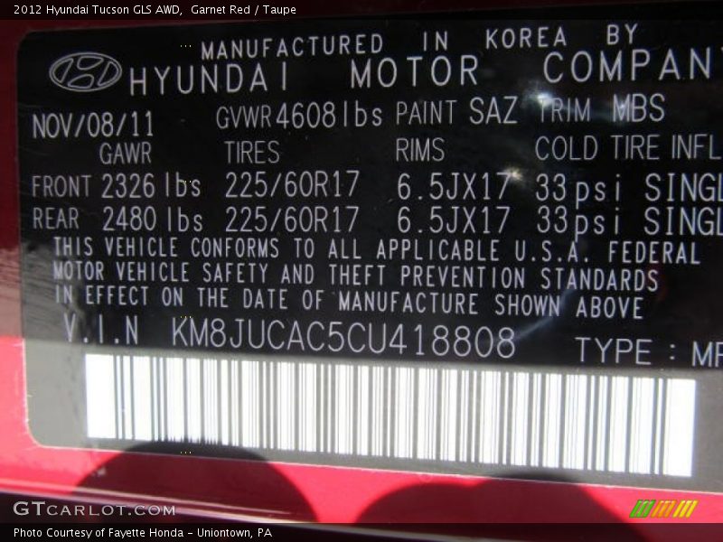 Garnet Red / Taupe 2012 Hyundai Tucson GLS AWD