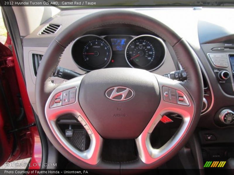 Garnet Red / Taupe 2012 Hyundai Tucson GLS AWD