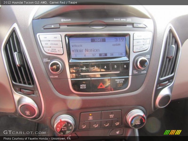 Garnet Red / Taupe 2012 Hyundai Tucson GLS AWD