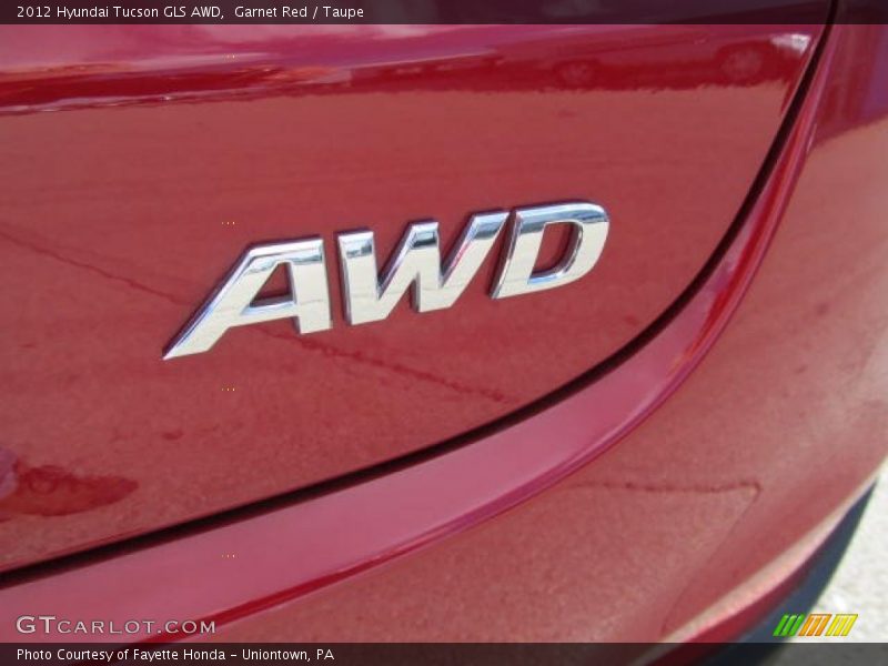 Garnet Red / Taupe 2012 Hyundai Tucson GLS AWD