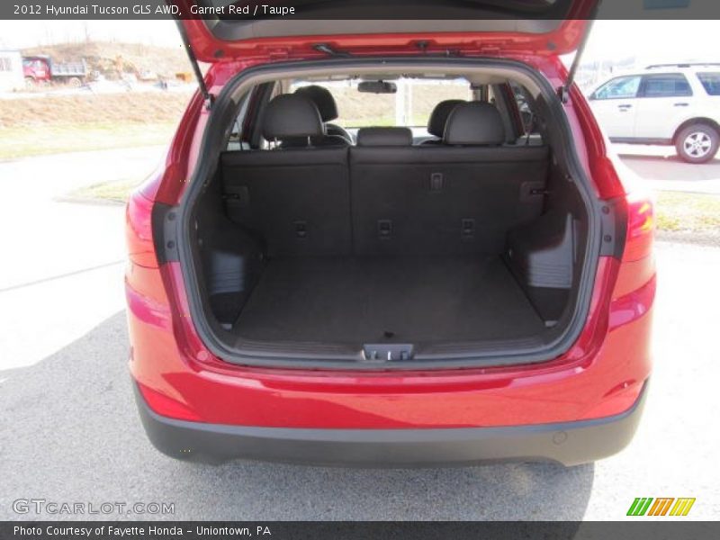 Garnet Red / Taupe 2012 Hyundai Tucson GLS AWD