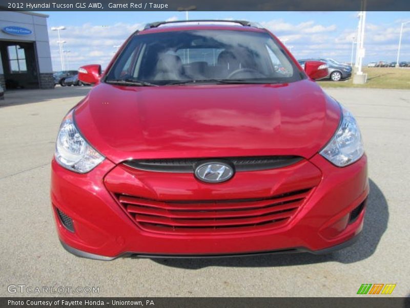 Garnet Red / Taupe 2012 Hyundai Tucson GLS AWD