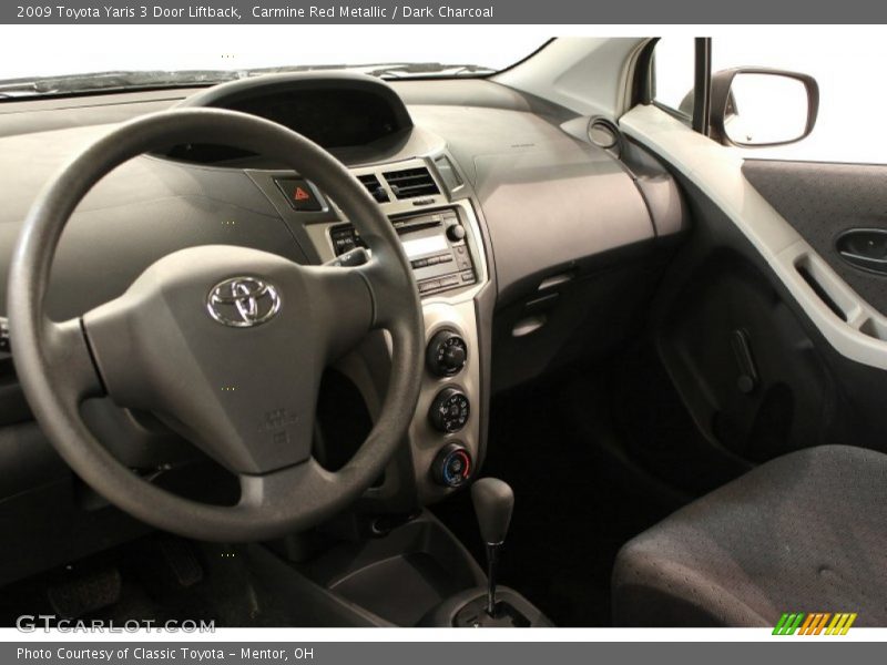 Carmine Red Metallic / Dark Charcoal 2009 Toyota Yaris 3 Door Liftback