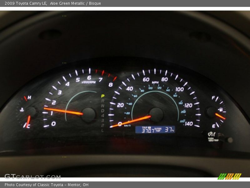 Aloe Green Metallic / Bisque 2009 Toyota Camry LE