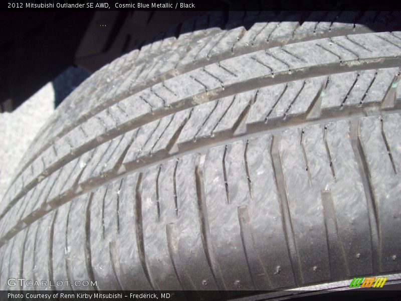 Cosmic Blue Metallic / Black 2012 Mitsubishi Outlander SE AWD