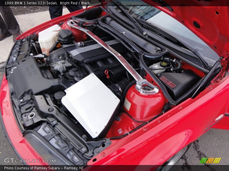 Bright Red / Black 1999 BMW 3 Series 323i Sedan