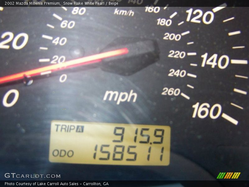 Snow Flake White Pearl / Beige 2002 Mazda Millenia Premium
