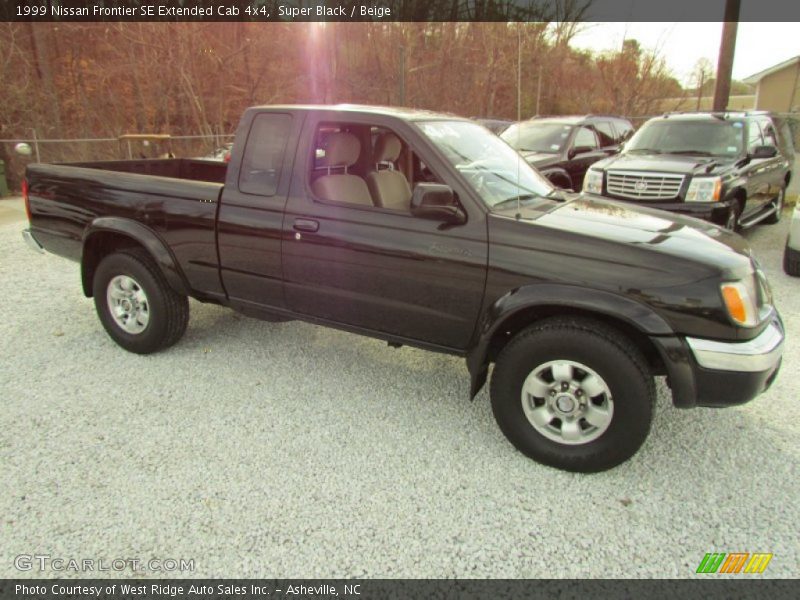 Super Black / Beige 1999 Nissan Frontier SE Extended Cab 4x4