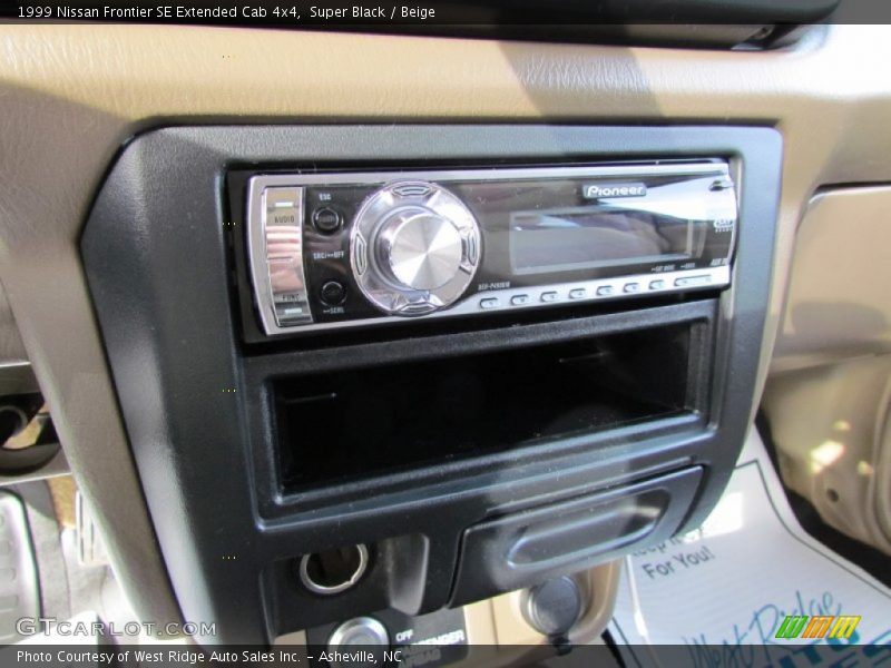 Super Black / Beige 1999 Nissan Frontier SE Extended Cab 4x4