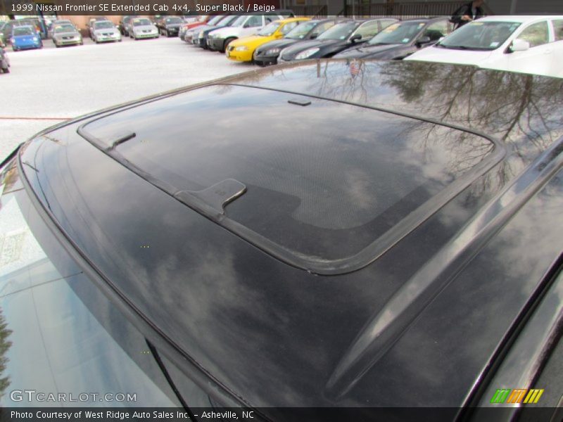 Super Black / Beige 1999 Nissan Frontier SE Extended Cab 4x4